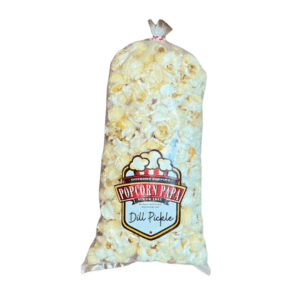 A bag of popcorn with the logo for del pueblo.
