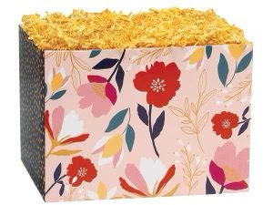 A pink floral box with gold shredded paper.