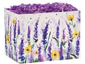 A purple and yellow flower box with some purple shredded paper