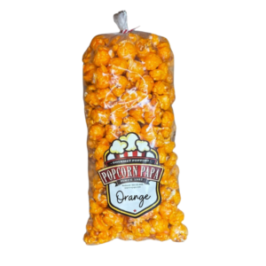 A bag of popcorn that is orange.